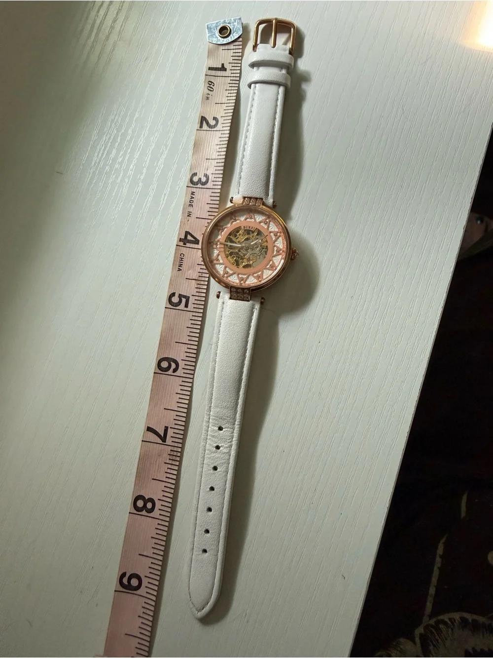 Bureau Rose Gold Skeleton Dial Watch with White leather Strap